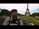 Saype artiste belfortain crée une fresque pour SOS Méditerranée au pied de la Tour Eiffel