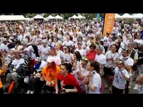 Echauffement du footing multicolore solidaire à Epinal