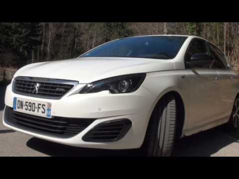 Au volant de la 308 GT...