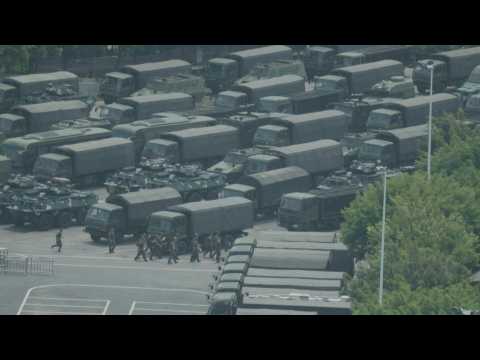 AFPTV EXCLUSIVE: Chinese military personnel parade near Hong Kong border