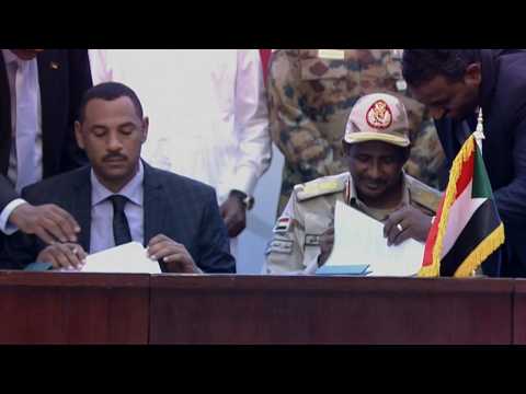 Sudanese sign historic deal for a transition to civilian rule