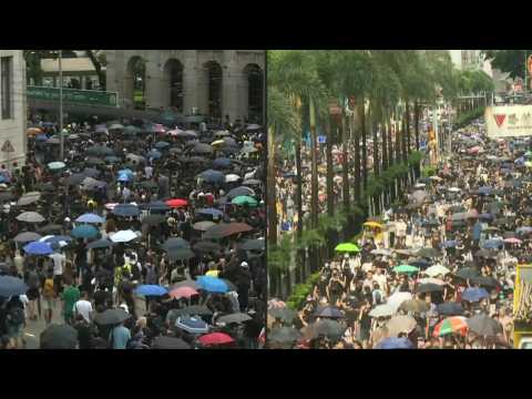 Flouting police ban, Hong Kong protesters flood city streets