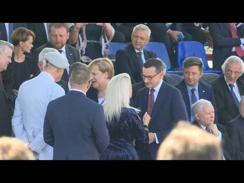 Merkel, Pence and other officials arrive at WWII commemoration ceremony