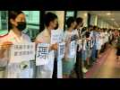 Hong Kong medical workers show support for pro-democracy protesters