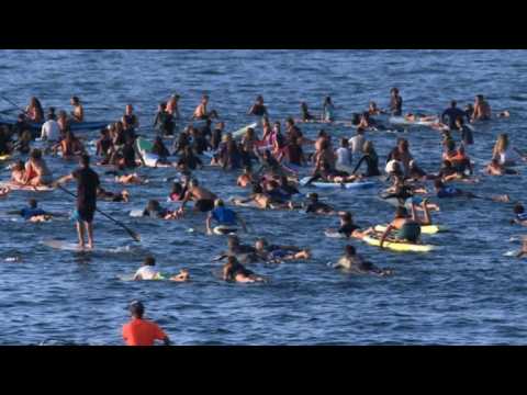 Surfers rally for the planet ahead of G7