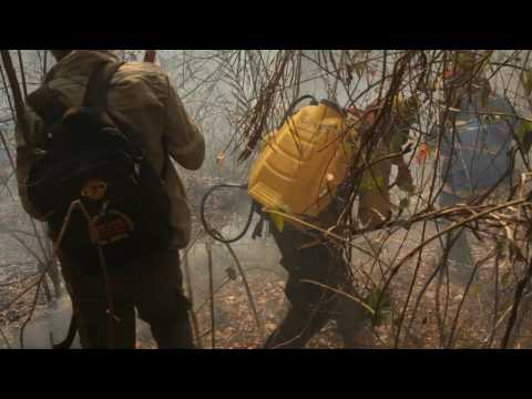 Firefighters battle fire in eastern Bolivia