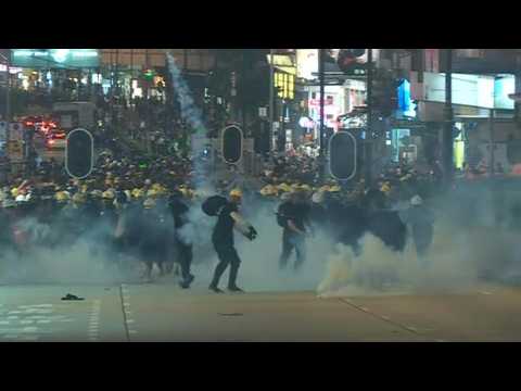 Hong Kong riot police fire tear gas at protesters