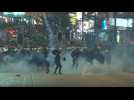 Hong Kong riot police fire tear gas at protesters