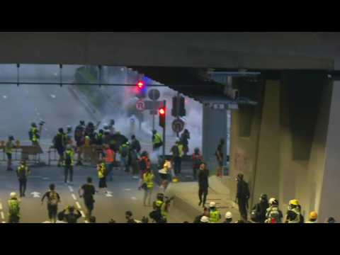 Tear gas fired again in Hong Kong as protesters change tactics