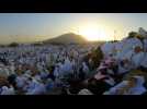 Muslim pilgrims pray at Mount Arafat