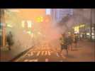 Police in Hong Kong fire tear gas as street protests continue