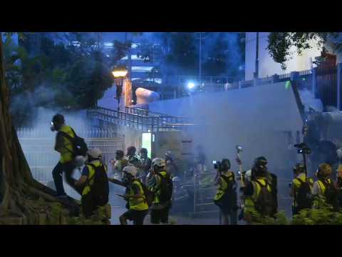 Volleys of tear gas in Hong Kong protesters take shopping district again
