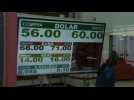 Argentine peso plummets 14% after crushing Macri vote defeat - Label : AFPTV - First images - Category : Business