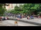 Hong Kong cops clash with protesters in working-class district - Label : AFPTV - First images - Category : News