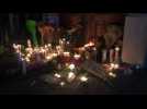 People hold candlelight vigil for Dayton shooting victims