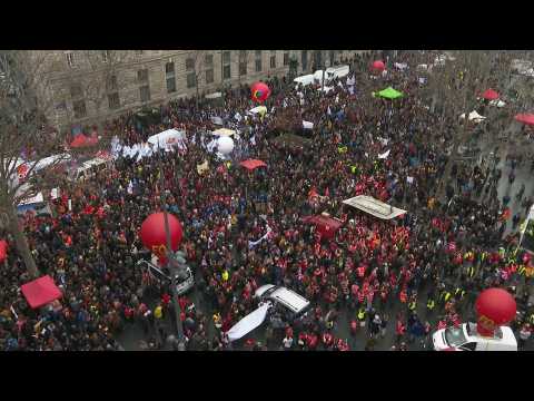 Anti-pension reform protesters take to the streets of the French capital during a day of mass rallies across the country