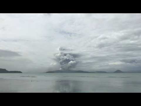 Philippines on alert as volcano spews ash, lava