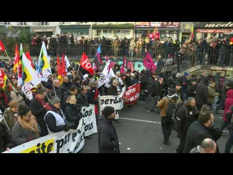 Protesters march in Paris against pension reform