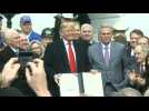 President Donald Trump signs USMCA trade agreement