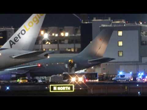 Coronavirus evacuees disembark plane in Frankfurt