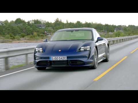 Porsche Taycan Turbo in Gentian Blue Driving in Norway