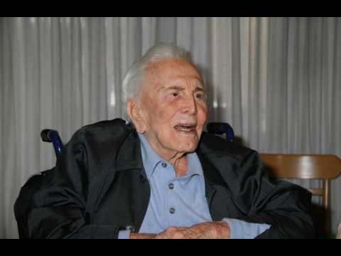 Kirk Douglas gives his fortune to charity