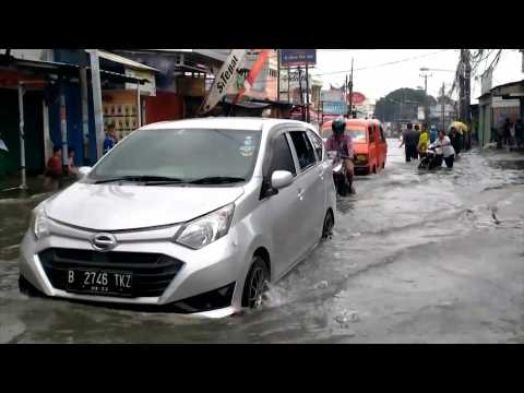 Jakarta swamped by flooding after torrential rains