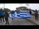 Greek nationalists bring large Greek flag to border crossing with Turkey