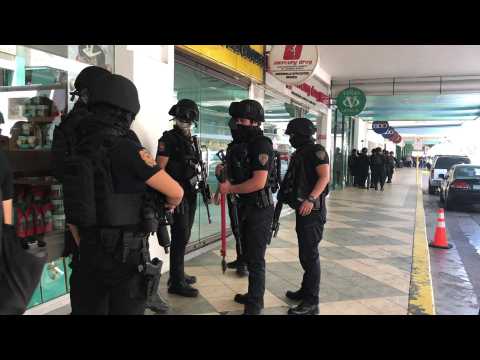 Police respond to reported mass hostage-taking at Manila mall
