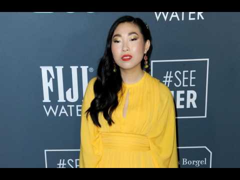 Awkwafina red carpet look inspired by 'power'