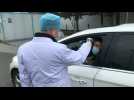 China virus: Makeshift temperature checkpoint in Wuhan - Label : AFPTV - First images - Category : News