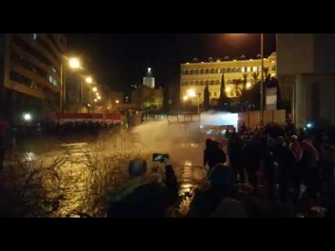 Lebanese security forces use water cannon to disperse protesters in Beirut
