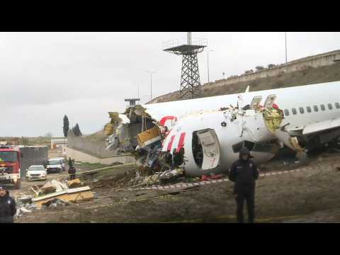 Scene of Turkish plane after it skidded off Istanbul runway killing three