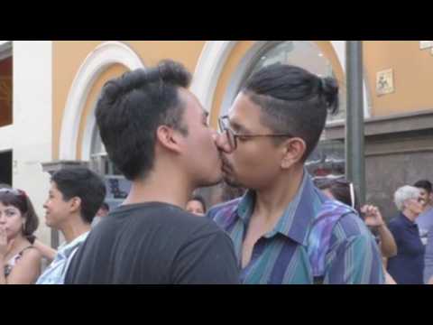 LGBT activists hold kissing protest in Lima