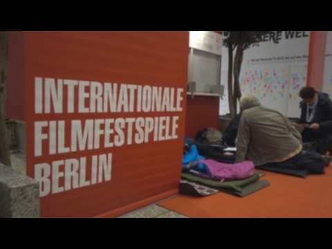 Ticket buyers prepare for a night stay outside Berlinale box office