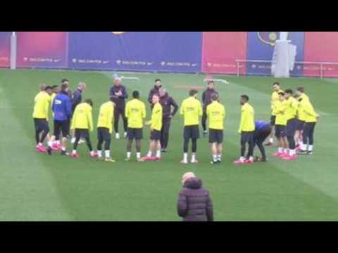 FC Barcelona's Pique and Neto get back to training