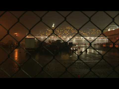 Americans leave quarantined Japan ship as virus cases hit 355