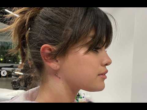 Selena Gomez gets album name tattooed on her neck