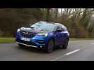 The new Opel Grandland X Hybrid 4 in Blue Driving Video