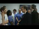French president visits hospital where first French coronavirus victim died