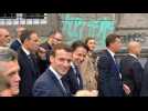 Giuseppe Conte and Emmanuel Macron walk through Naples historic centre
