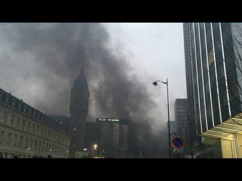 Black smoke engulfs Paris's Gare de Lyon after arson on fringes of protest