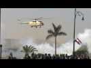 Helicopter carrying the body of Mubarak arrives ahead of his funeral in Cairo