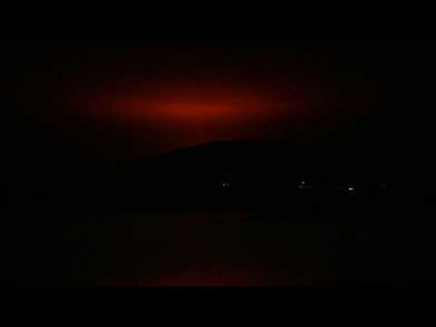 Icelandic volcano eruption lights up night sky near Reykjavik