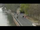 Banks of Seine deserted in Paris on first day of new lockdown