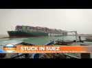 Suez Canal: Owner of wedged container ship apologises