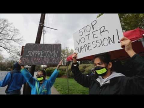 Group of activists protest against new voting laws plans in Georgia