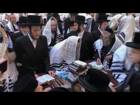Jews attend the Priestly Blessing at the Wailing Wall
