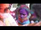 India crosses 12 million Covid-19 cases as revelers drench in Holi colors