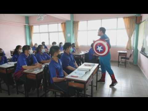 Thai teachers dressed as popular characters to encourage students during classes, exams